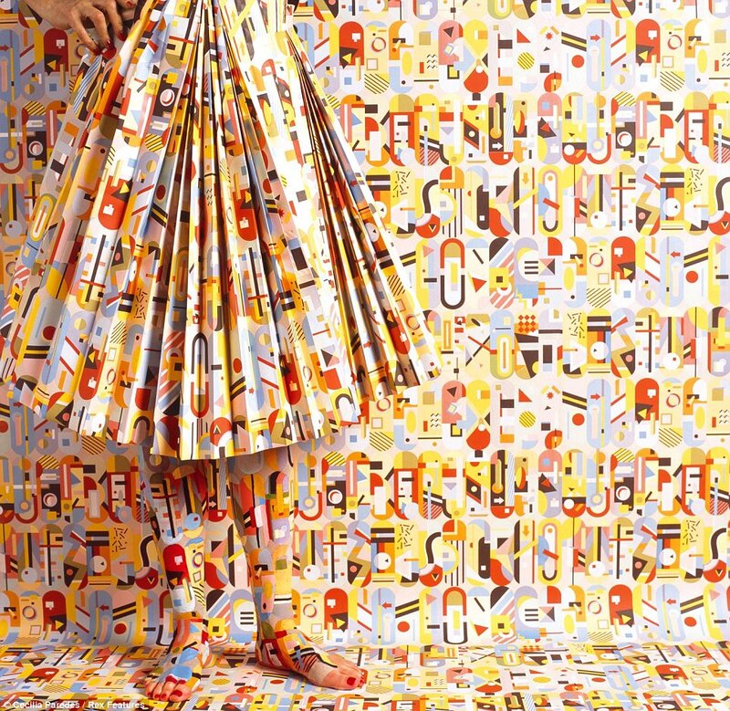 Person in Patterned Skirt — Yellow
