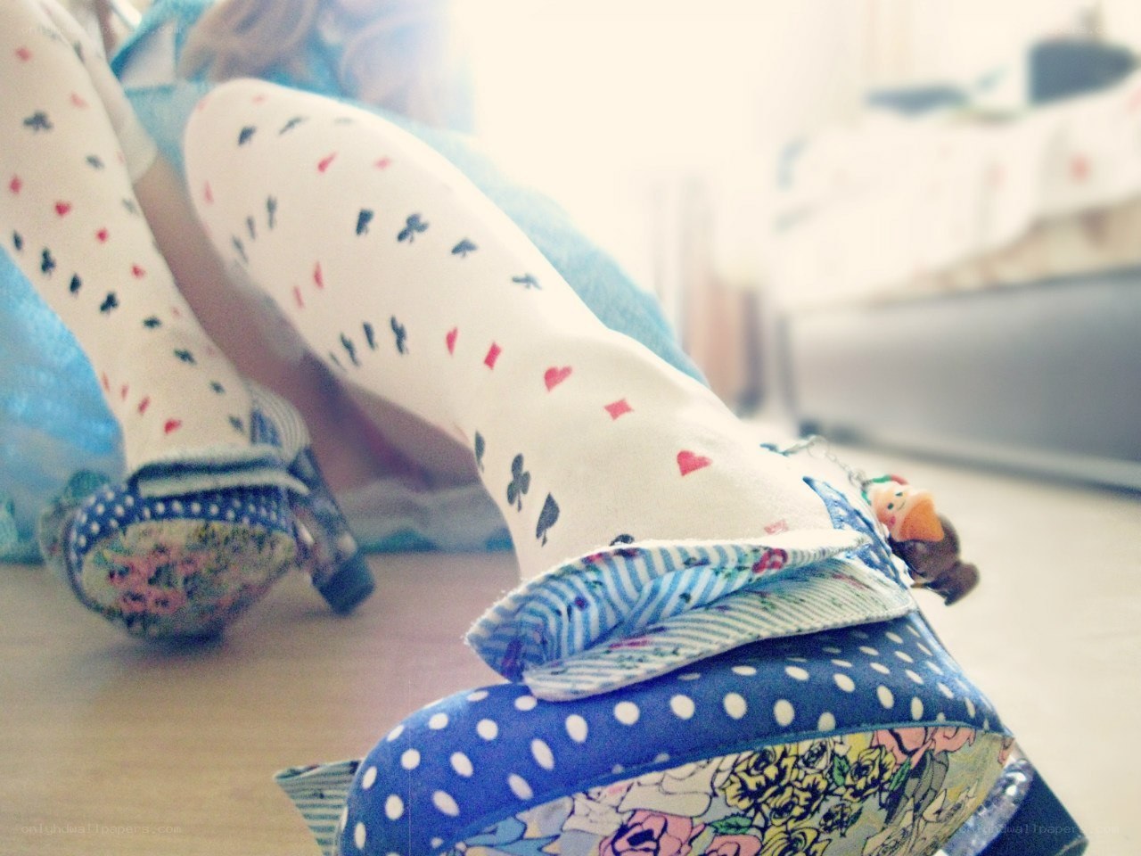 person in patterned socks and shoes