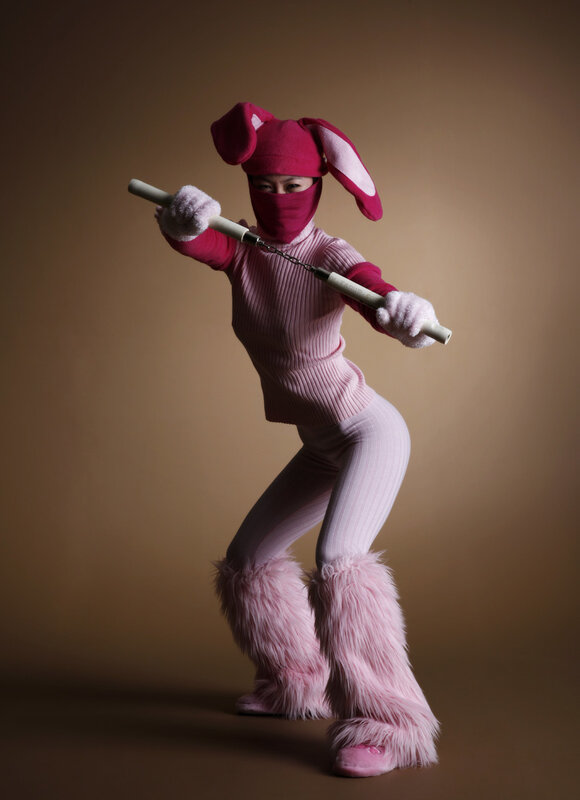 person in pink bunny costume