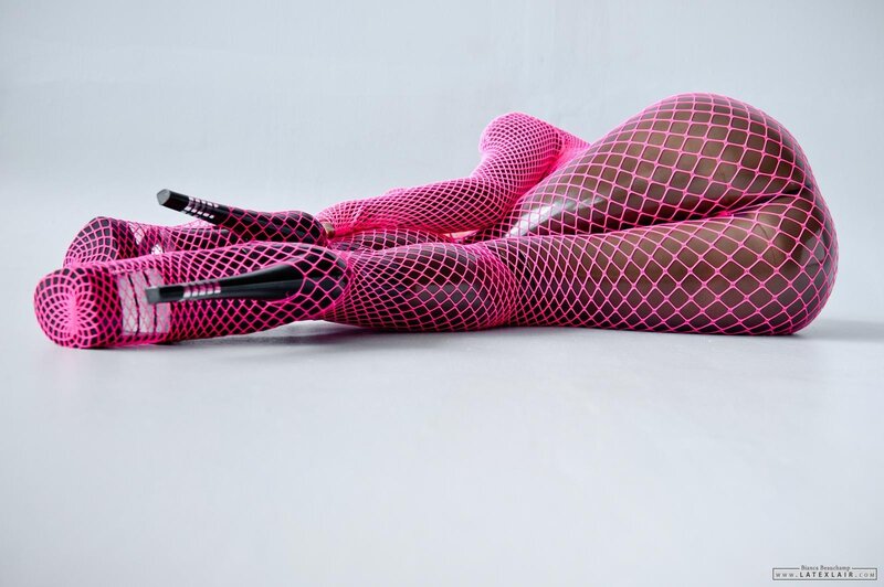 person in pink fishnet tights