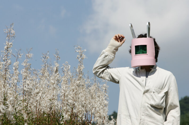 person in pink helmet mask