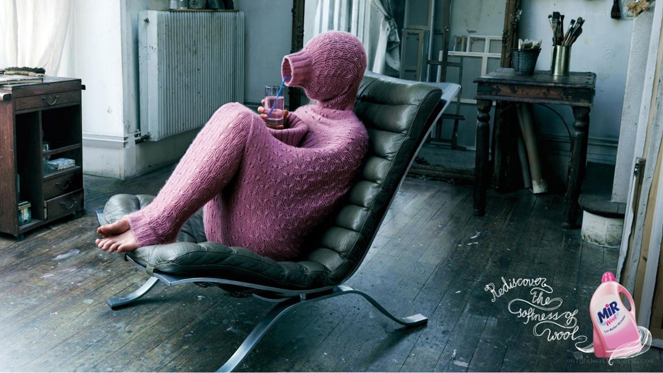 person in pink wool suit