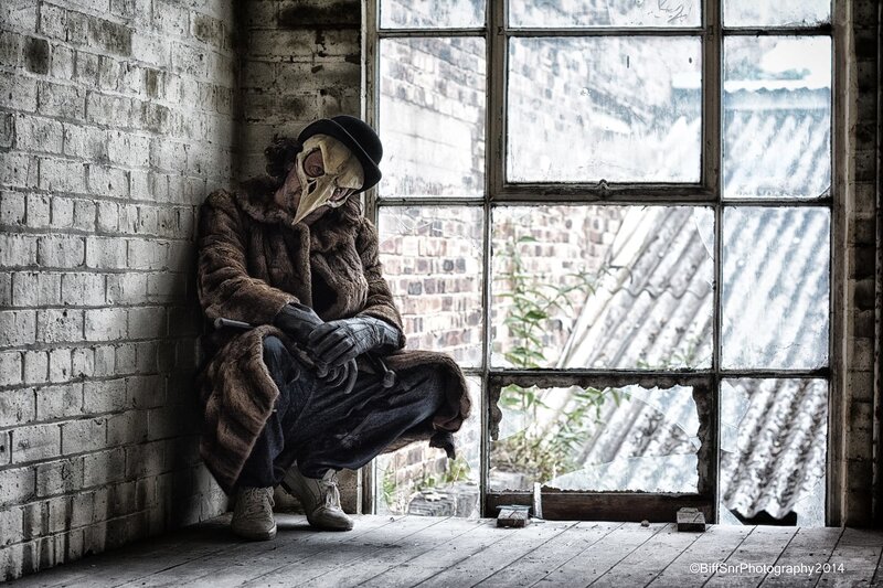Person in Plague Doctor Mask