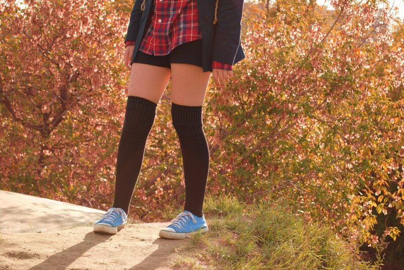 person in plaid outfit