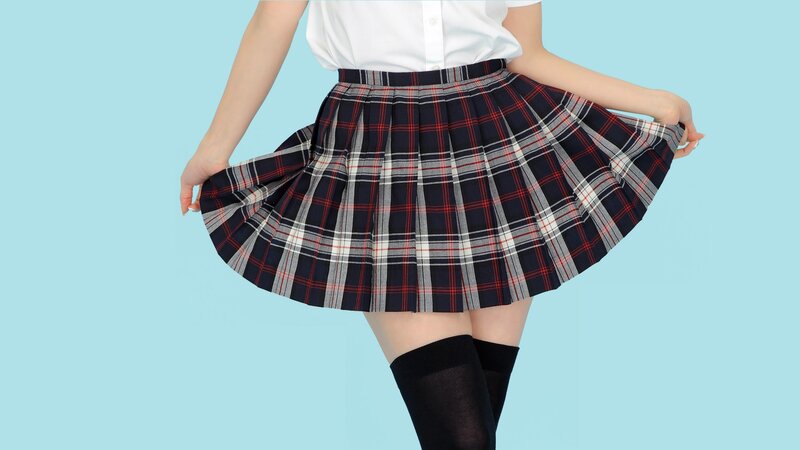 person in plaid skirt