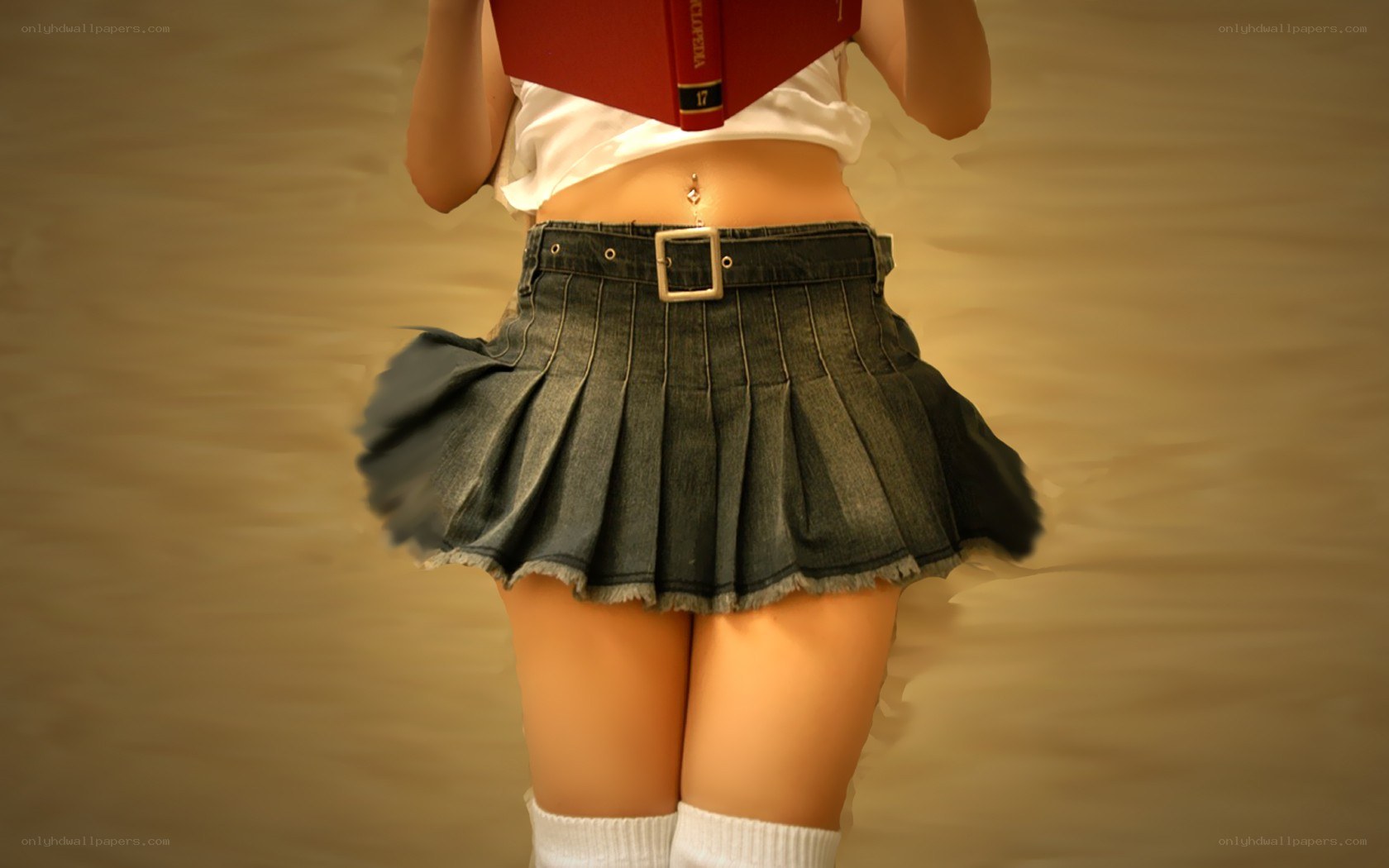 person in pleated skirt reading