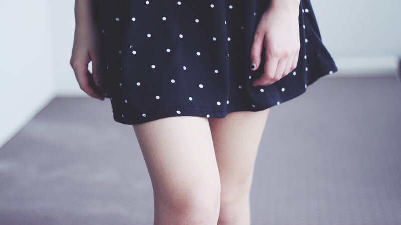 person in polka dot dress