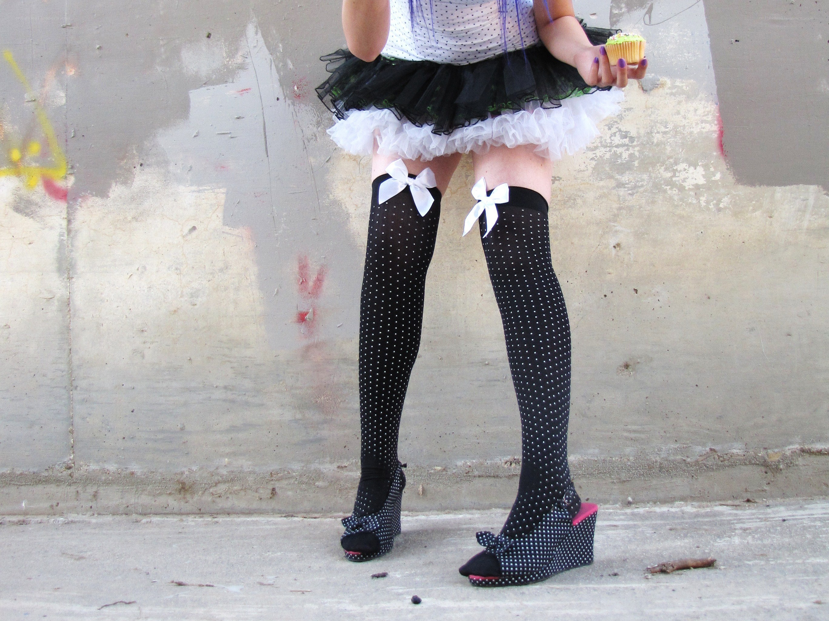 person in polka dot tights