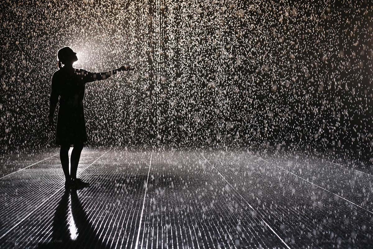 Person in rain installation