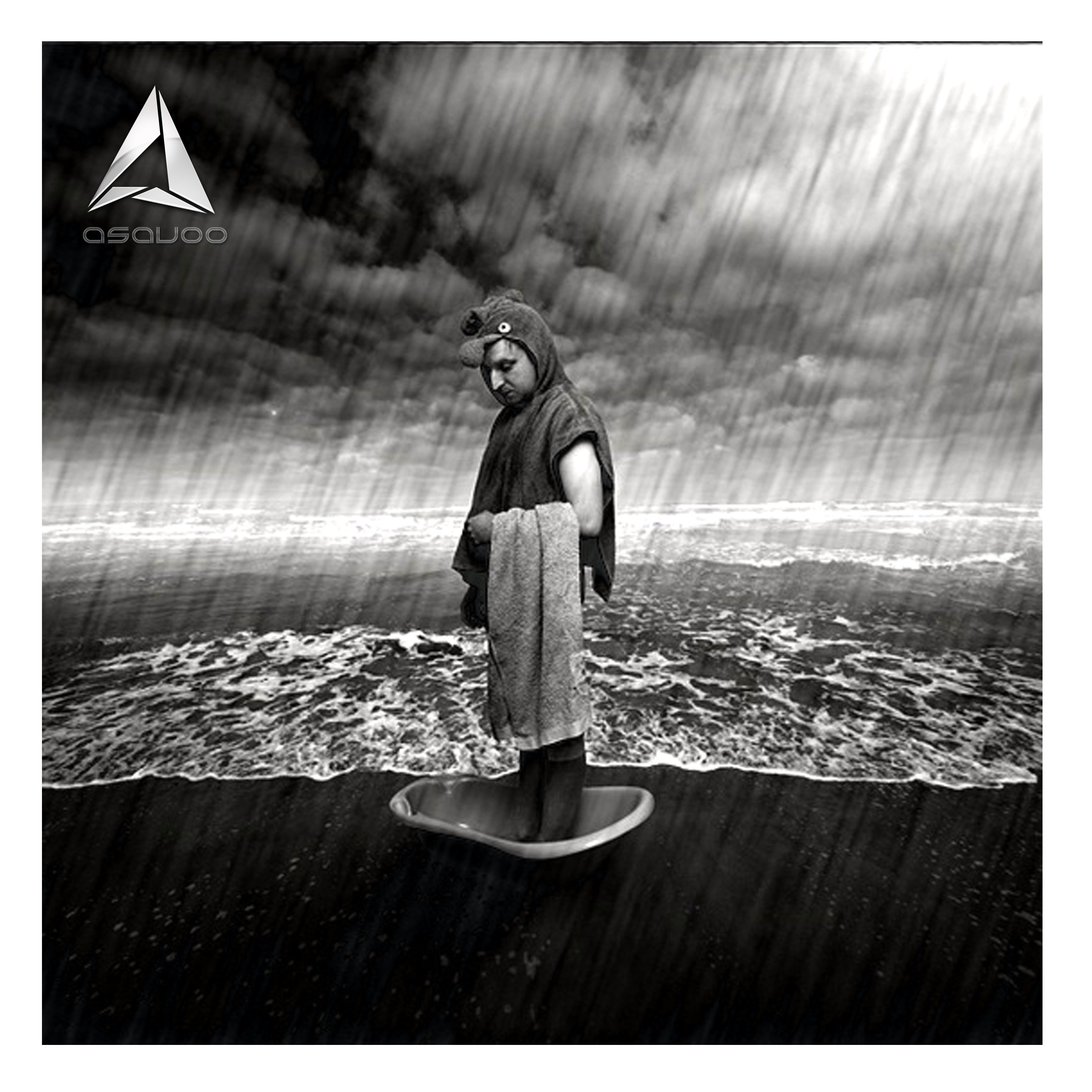 person in rain on beach