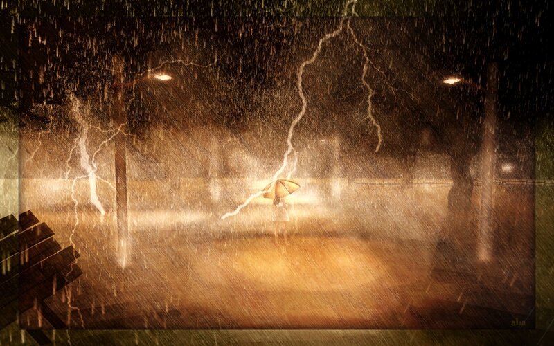Person in rainstorm with umbrella