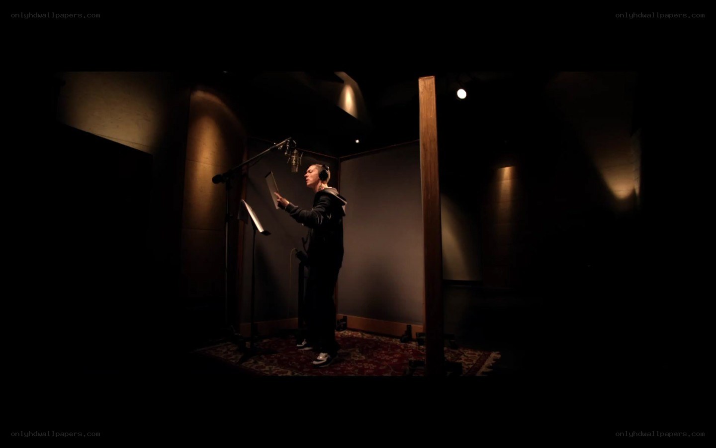 person in recording studio