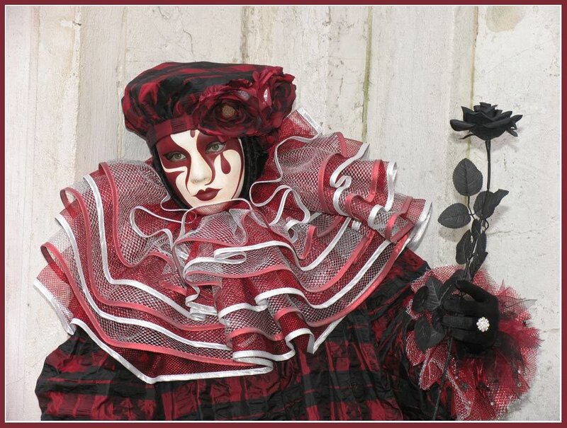 Person in Red and Black Costume