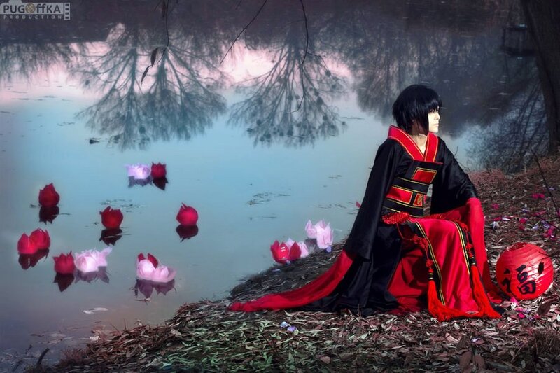 Person in Red and Black Robe — Serene