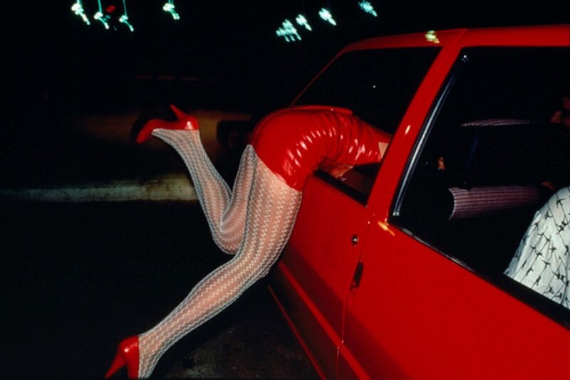 Person in Red Car