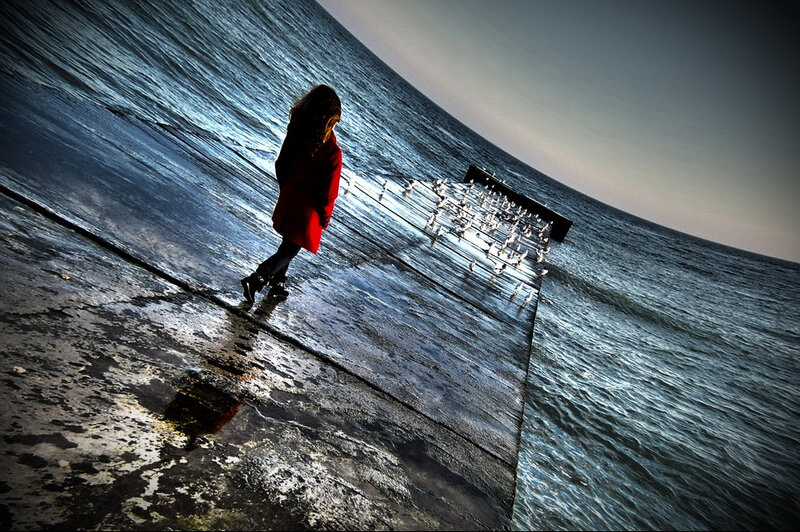 Person in Red Coat — Blue