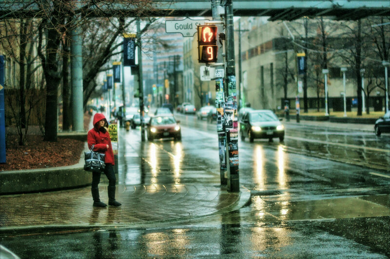 Person in Red Coat — Dreary