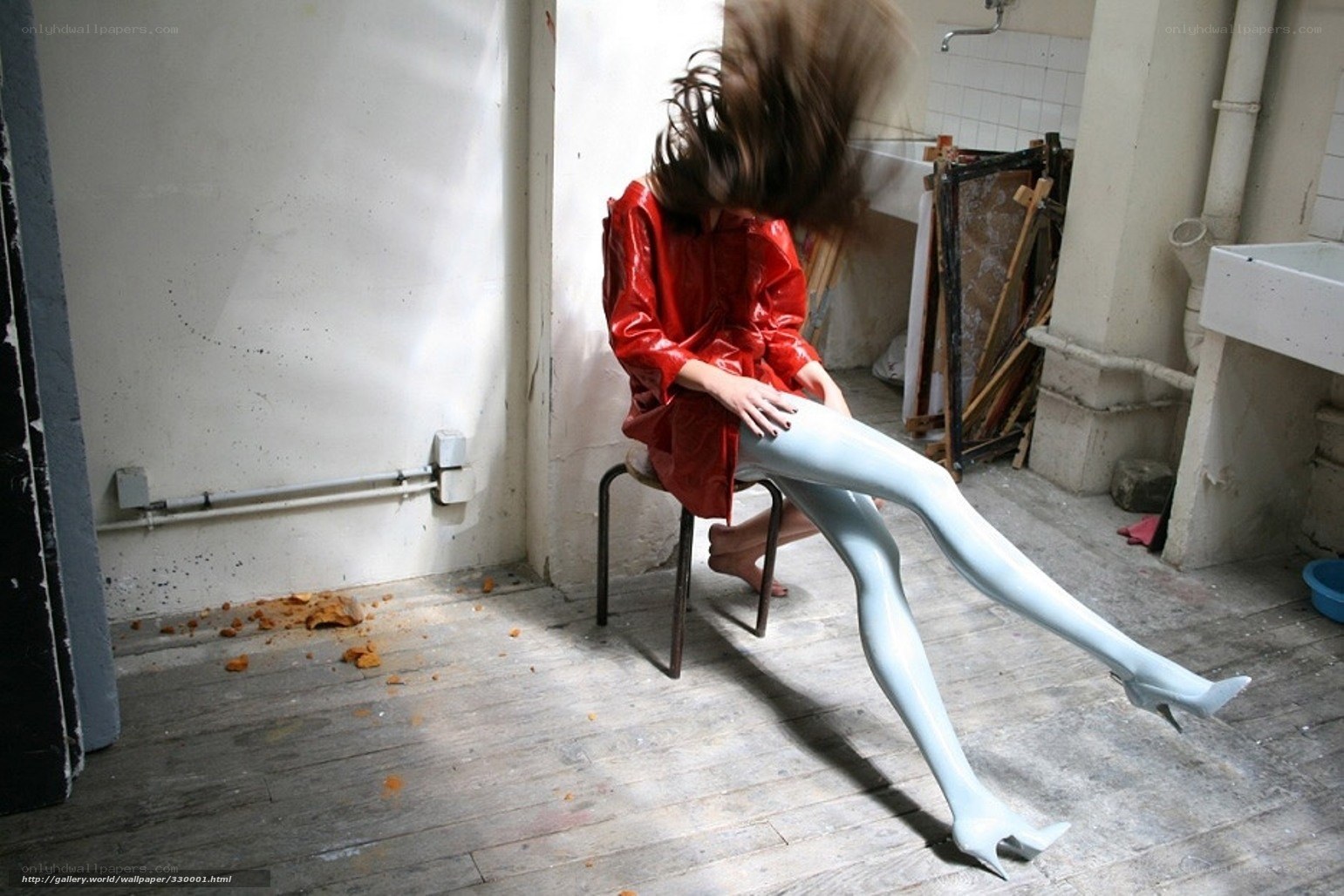 person in red coat on chair