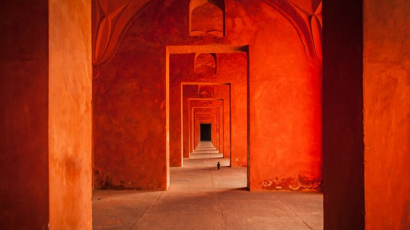 Person in Red Corridor