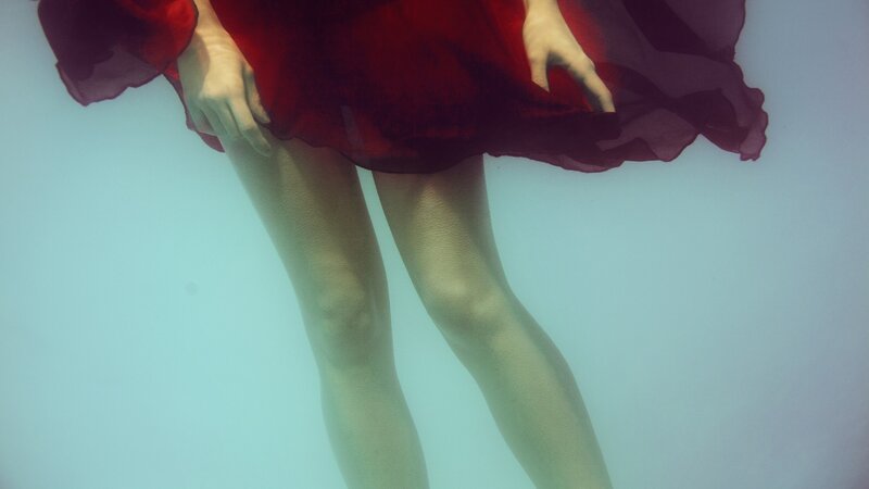 Person in Red Dress — Serene, Photograph