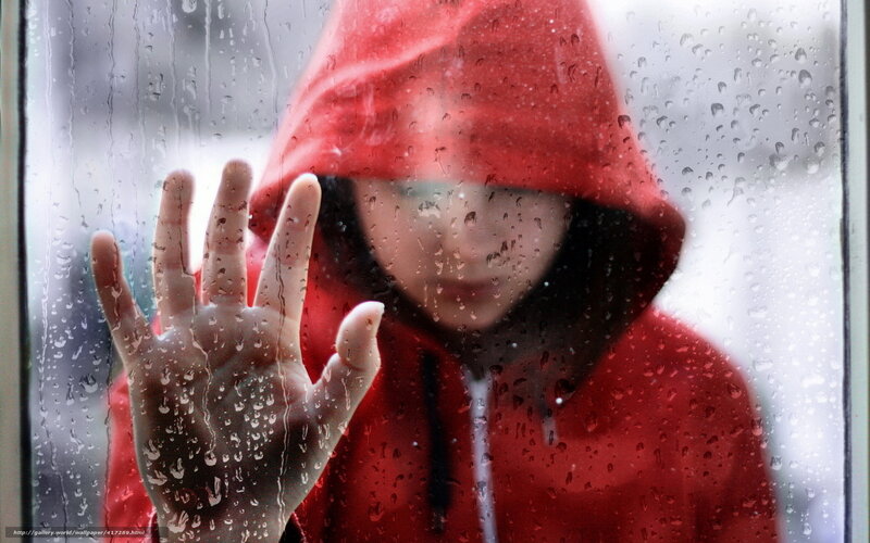 Person in Red Hoodie — Melancholic, Photograph