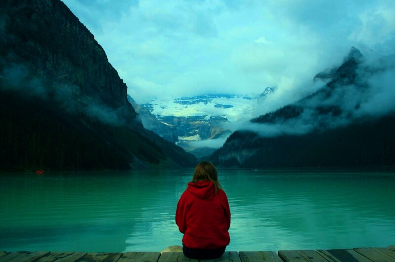 Person in Red Hoodie — Teal