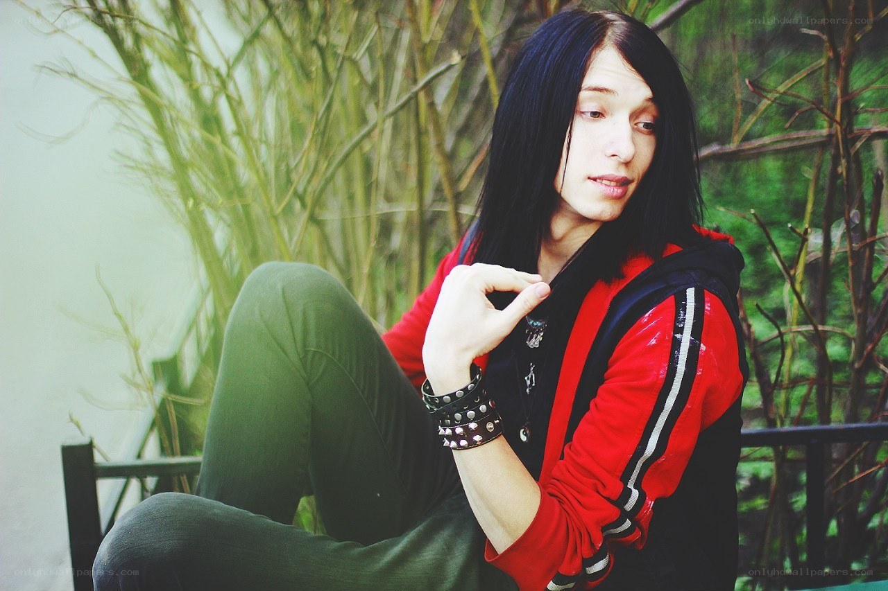 person in red jacket sitting