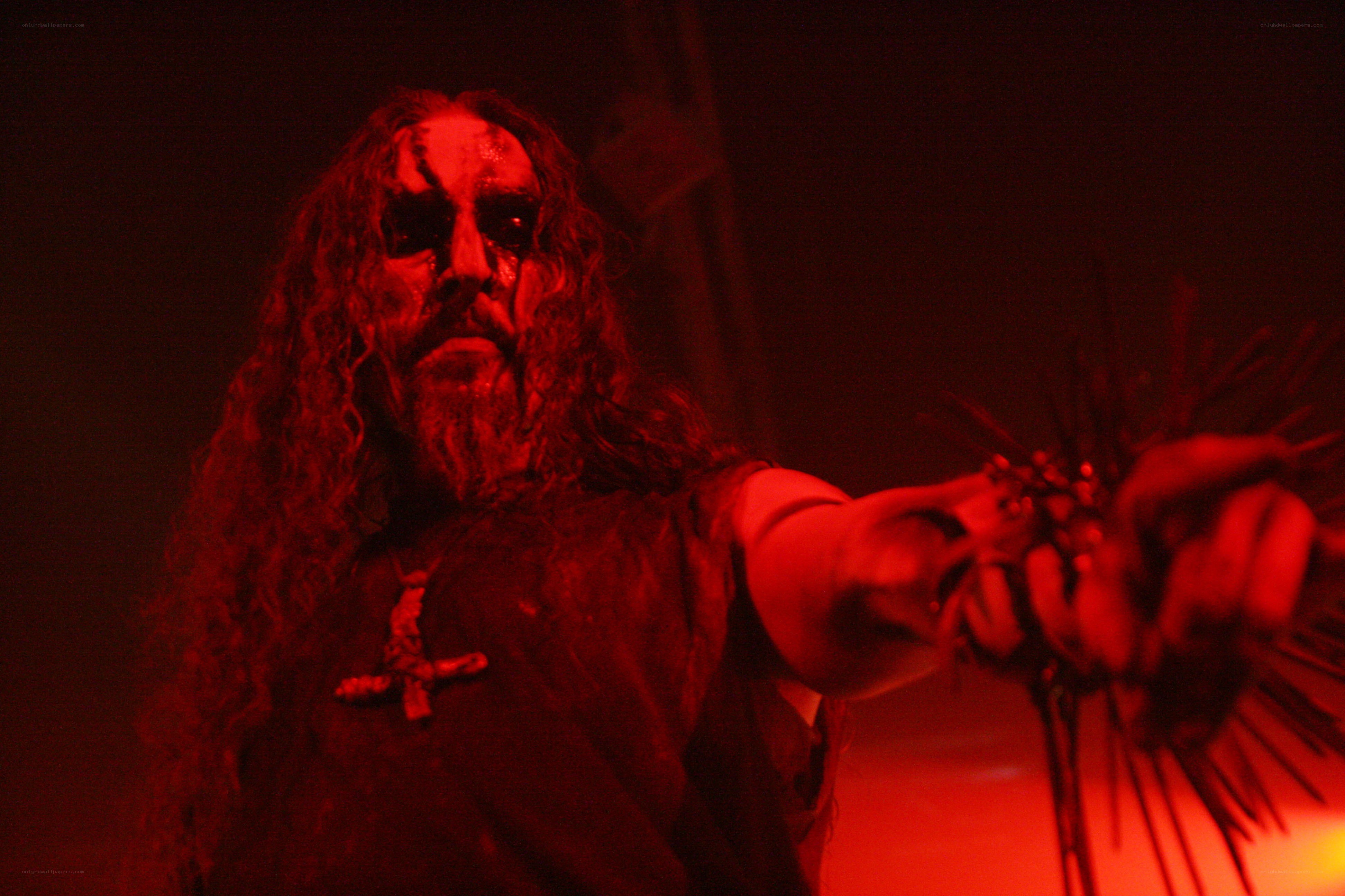 person in red light with cross