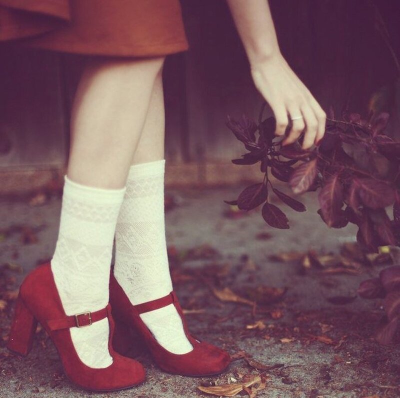Person in Red Shoes