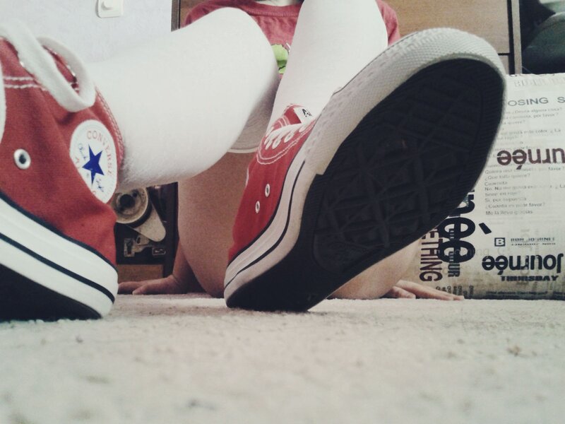 person in red sneakers