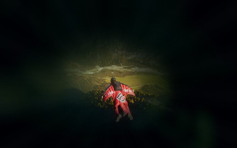 Person in Red Wingsuit — Dramatic, Afternoon