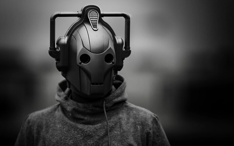 person in robotic mask