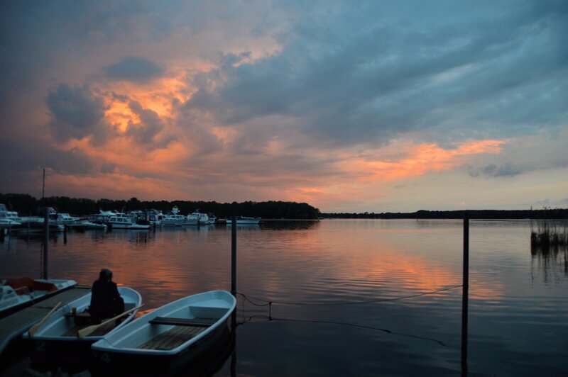 Person in Rowboat at Sunset
