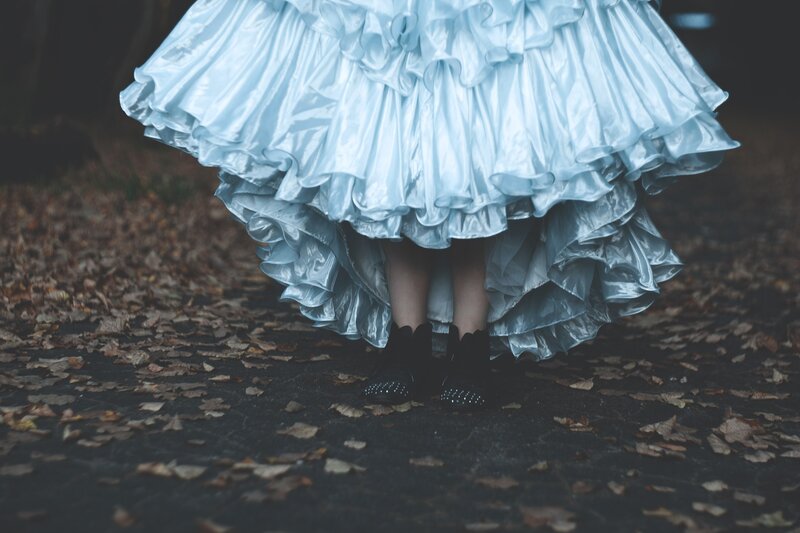 Person in Ruffled Dress — Blue