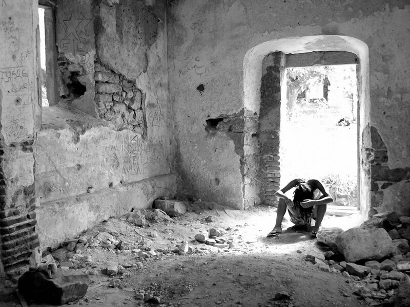Person in Ruined Building — Black