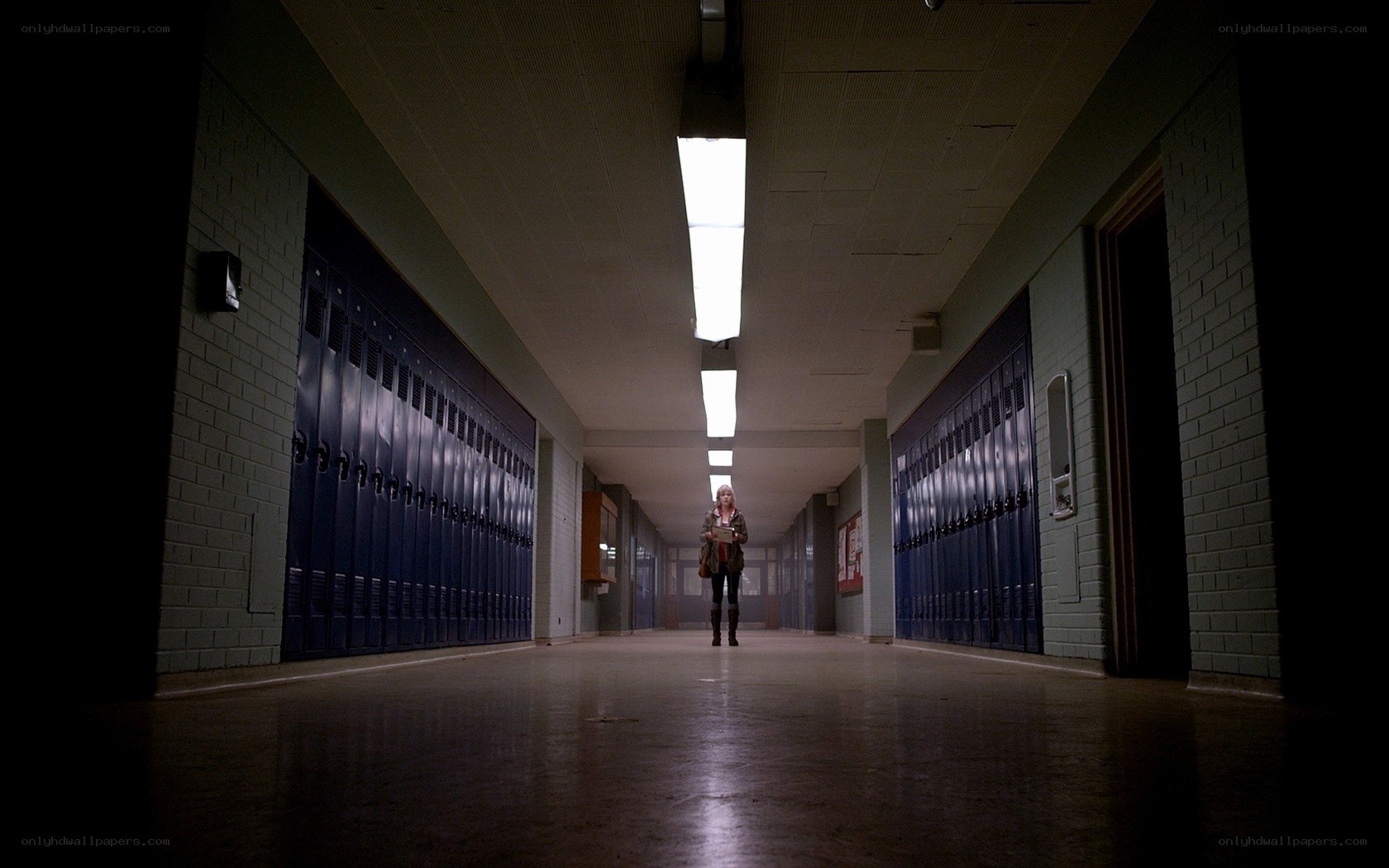 person in school hallway