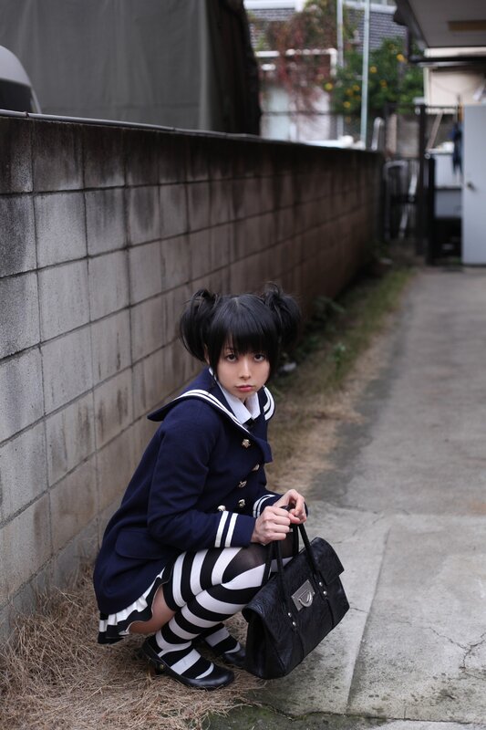 Person in School Uniform — Black, Serious