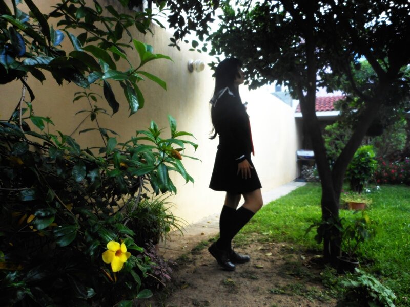person in school uniform outdoors