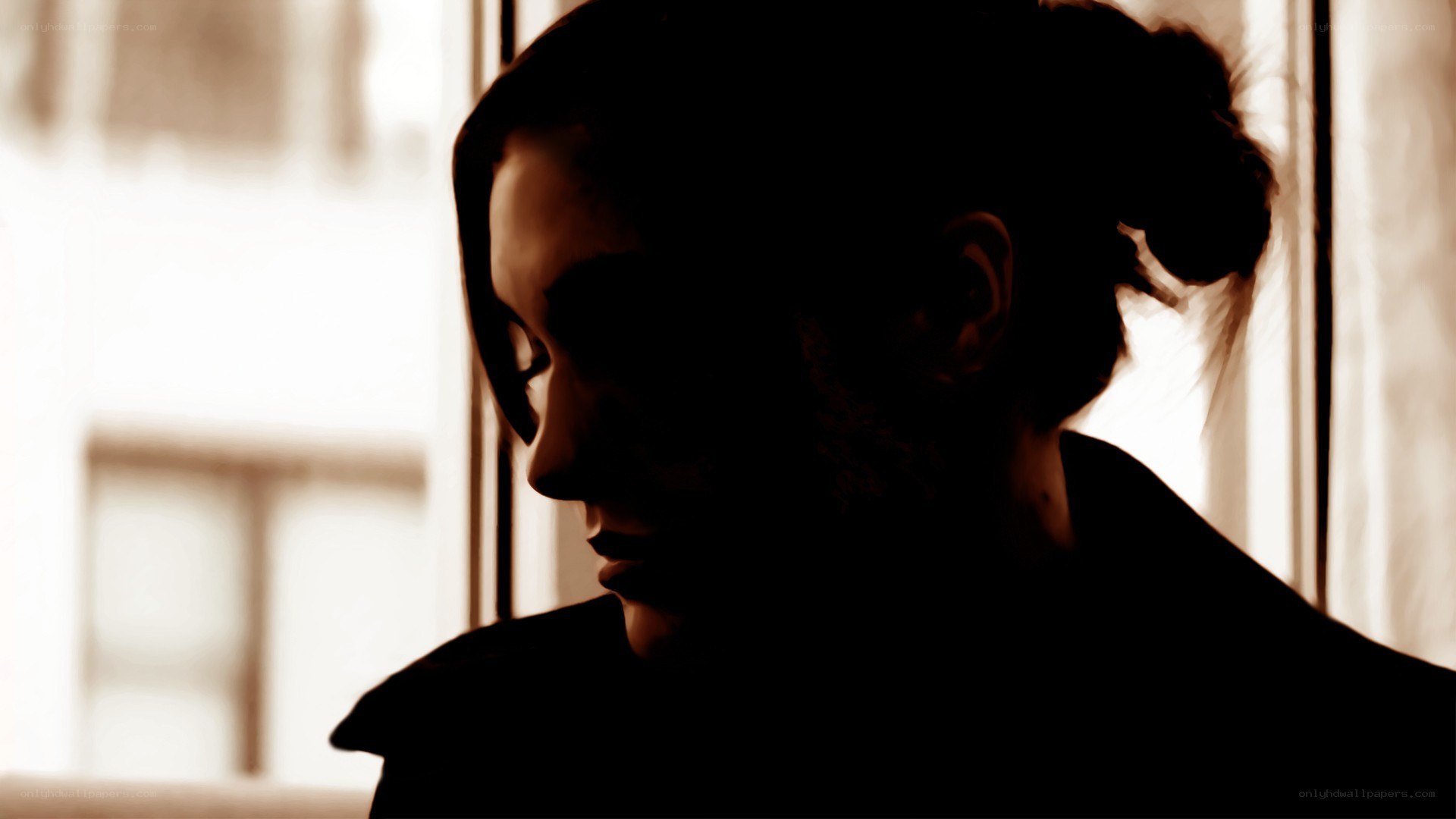 person in silhouette by window