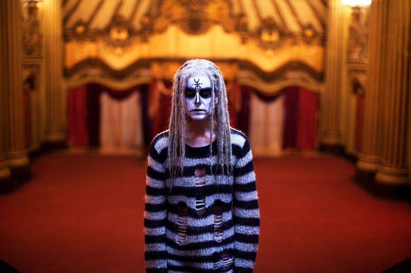 person in skeleton makeup on stage
