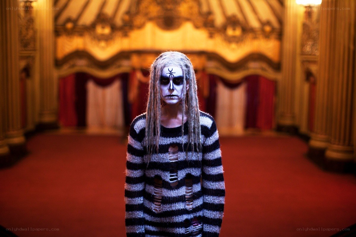 person in skeleton makeup on stage