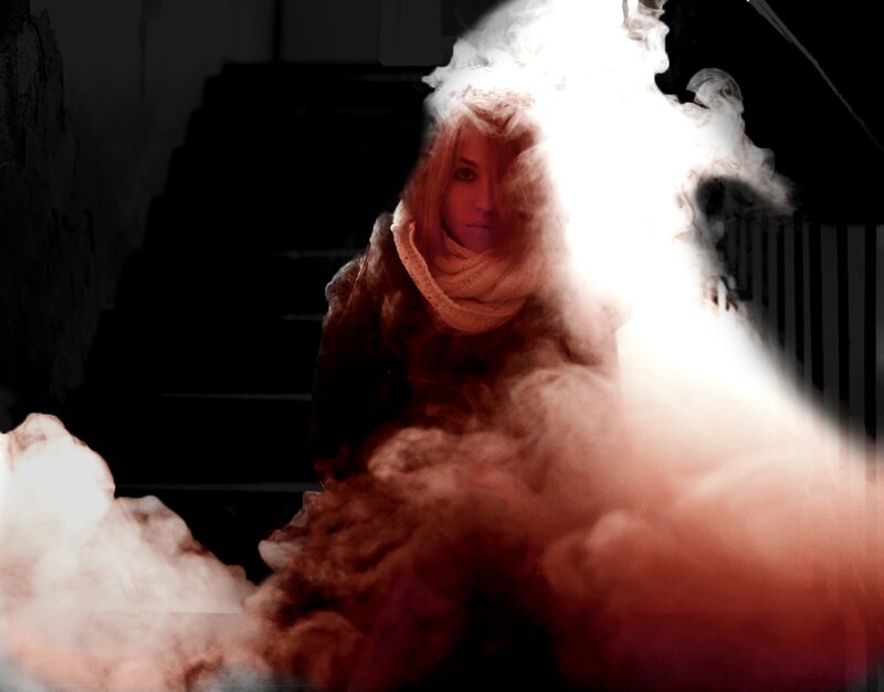 person in smoke on stairs