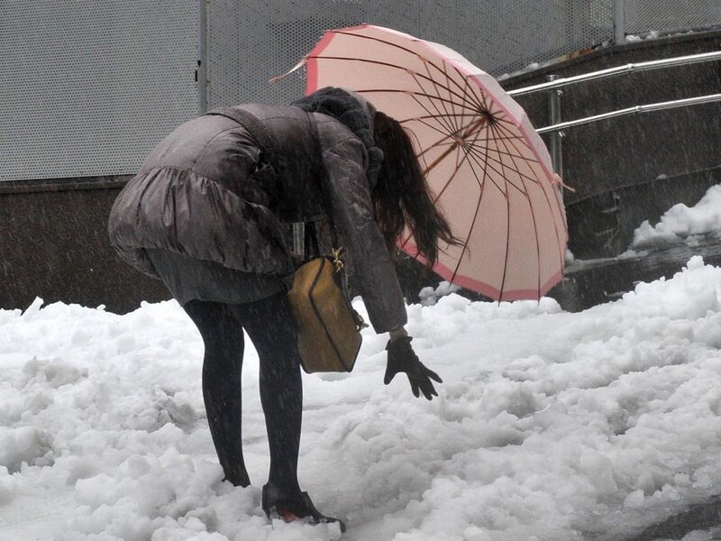 Person in Snow with Umbrella — White