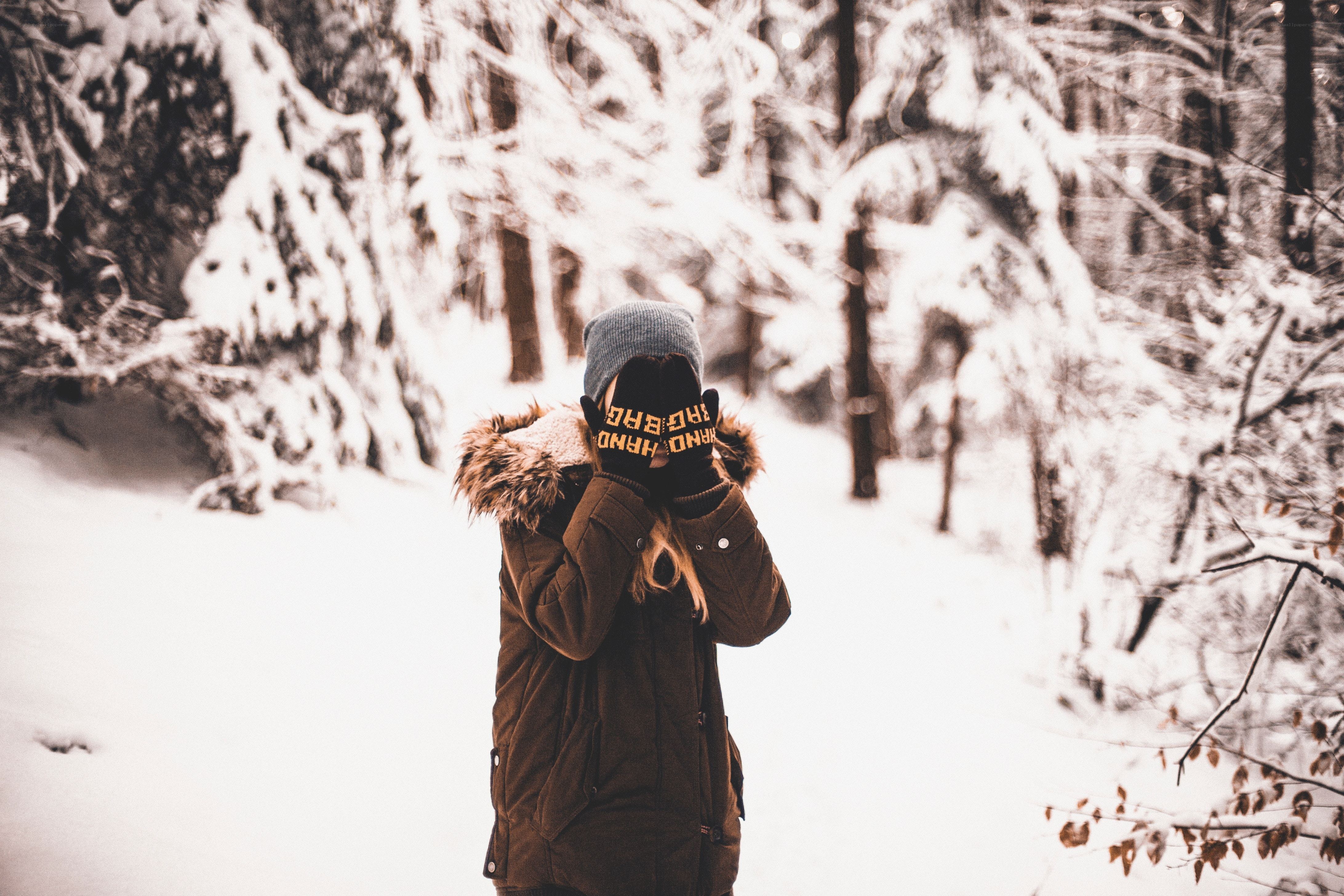 person in snowy forest