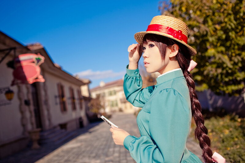 Person in Straw Hat — Blue