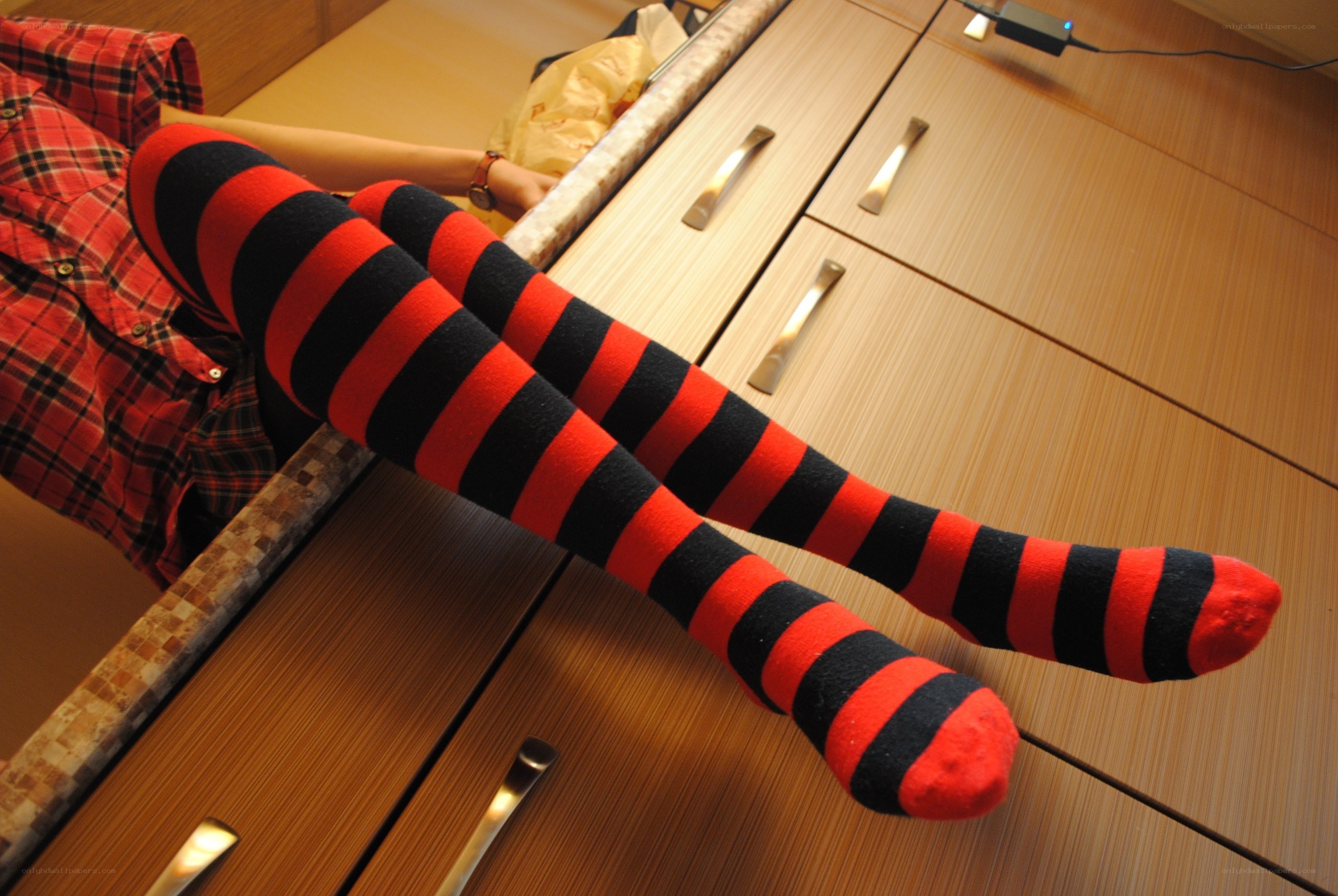 person in striped socks