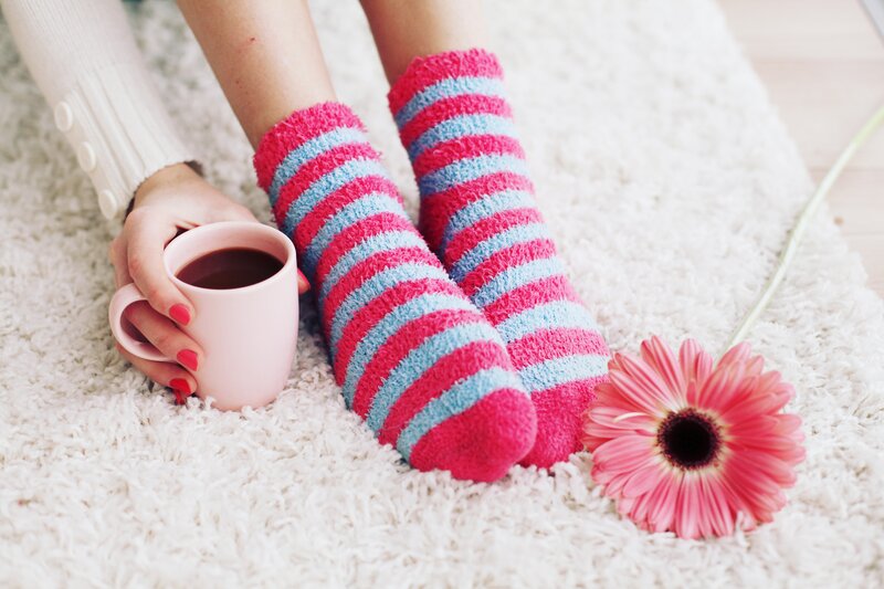 Person in Striped Socks — Pink