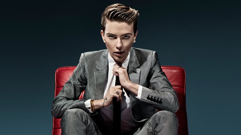 Person in Suit Sitting