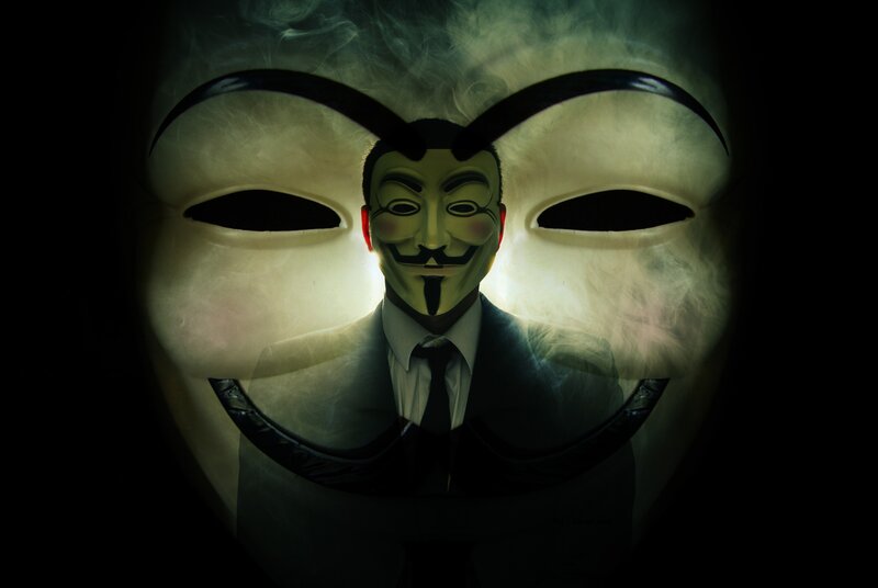 Person in Suit Wearing Mask — Black
