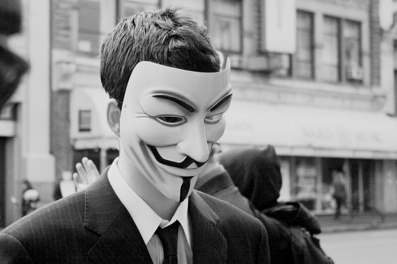 Person in Suit Wearing Mask